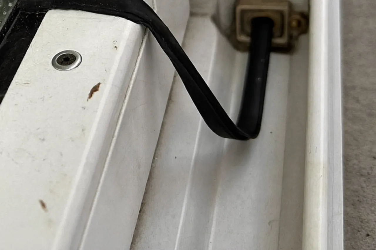 Close-up of a misted double-glazed sealed unit with a failed edge seal