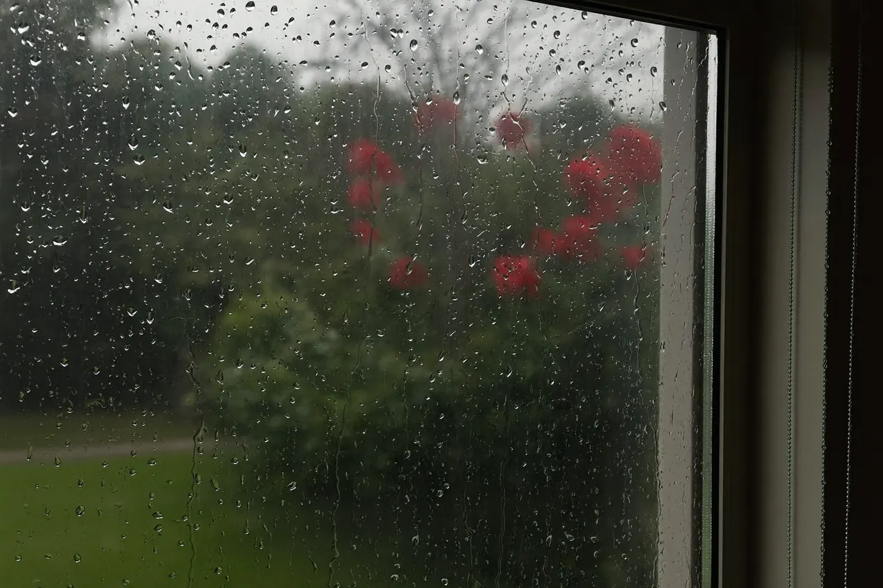 Rain beading and running off a well-sealed modern window
