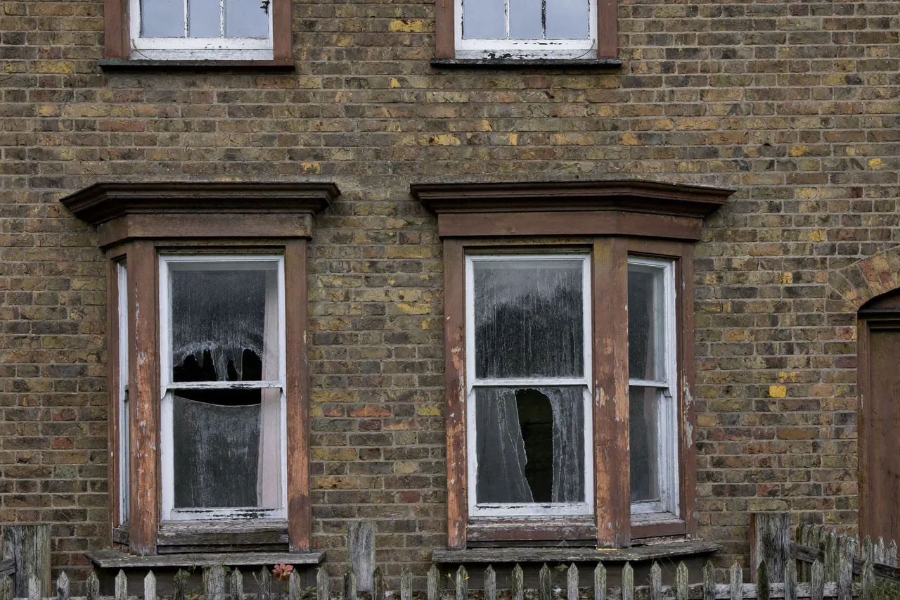 Tired, draughty old windows on a Victorian terrace due for replacement